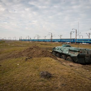 Ukrainian APC entrenched in on the border with Crimea after Crimea was annexed by Russia.  Russian annexation of Crimea was not recognized by international community and led to sanctions against Russia