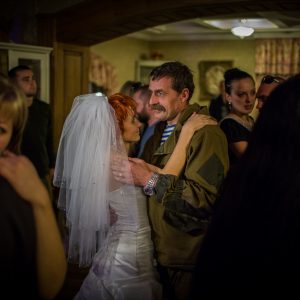 Igor Bezler also known as "Bes", a rebel field commander, 
dances with the bride at the wedding of his unit members in Gorlovka,
 Donetsk region, Ukrane