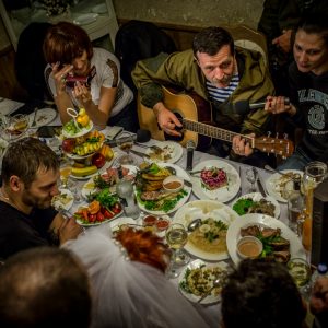 Igor Bezler also known as "Bes", a rebel field commander,
 plays guitar at the wedding of his unit members in Gorlovka, 
Donetsk region, Ukrane