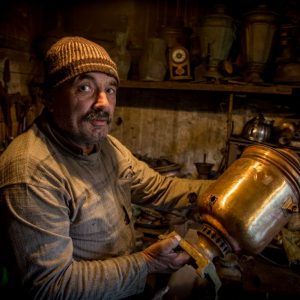 An antique restorer at work