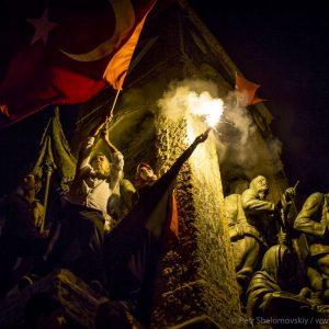 Pro-government supporters have climbed on top of the Republic monument as they celebrate failed coup attempt in Taksim square of Istanbul, Turkey