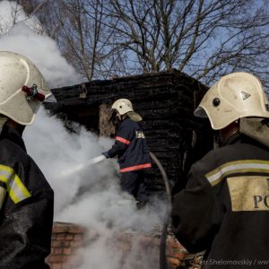 Firefighters that work in radiation contaminated area have no personal protection gear in Stary Vyshkov village in Western Russia