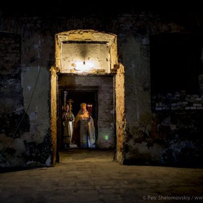 Priests and worshippers enter the  destroyed church in Petrovskiy district of Donetsk during the easter procession